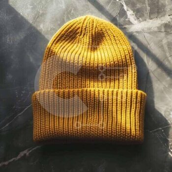 Intra Συλλεκτικό Ξύλινο Παζλ Plywood  4mm - Κίτρινο πλεκτό Beanie σε σκούρα μαρμάρινη επιφάνεια Σε Ξύλινο Κουτί - Διαστάσεις Puzzle: 10x10 cm – 25 κομμάτια - Image 1
