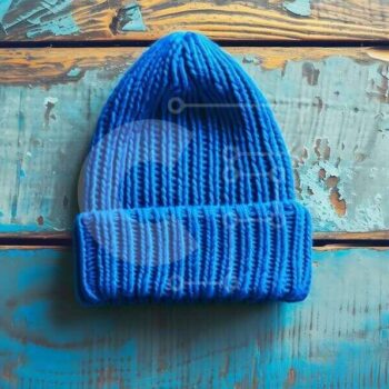 Intra Συλλεκτικό Ξύλινο Παζλ Plywood  4mm - Μπλε πλεκτό φασόλι σε ξύλινη επιφάνεια Σε Ξύλινο Κουτί - Διαστάσεις Puzzle: 10x10 cm – 25 κομμάτια - Image 1