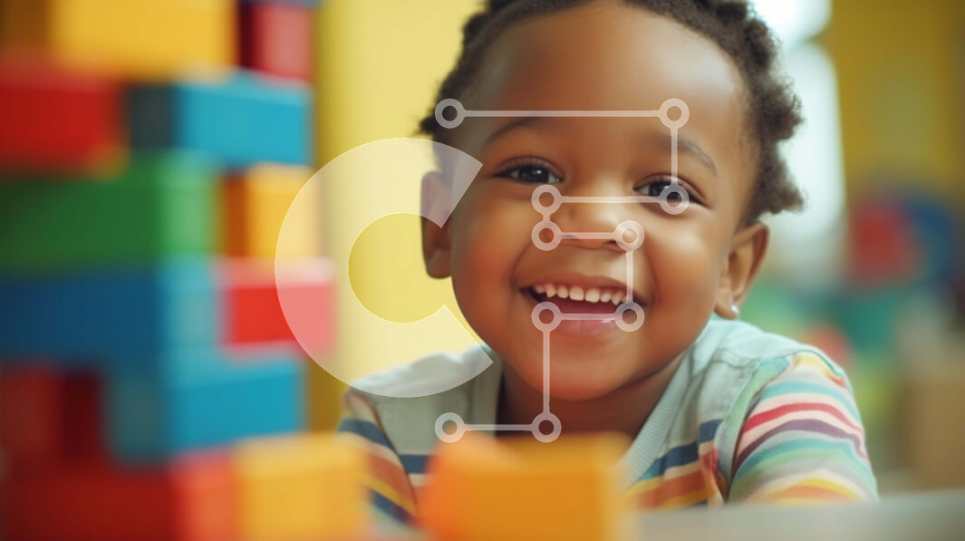 Intra Συλλεκτικό Ξύλινο Παζλ Plywood  4mm - Νεαρό μαύρο παιδί που παίζει με πολύχρωμους οικοδομικούς λίθους Σε Ξύλινο Κουτί - Διαστάσεις Puzzle: 10x10 cm – 25 κομμάτια