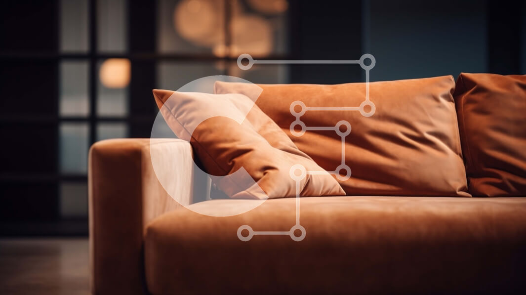 Intra Συλλεκτικό Ξύλινο Παζλ Plywood  4mm - Καφέ καναπές με πορτοκαλί μαξιλάρια σε δωμάτιο με χαμηλό φωτισμό Σε Ξύλινο Κουτί - Διαστάσεις Puzzle: 10x10 cm – 25 κομμάτια - Image 1