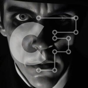 Intra Συλλεκτικό Ξύλινο Παζλ Plywood  4mm - Απόκοσμη φωτογραφία ενός άνδρα με καπέλο και μονόκλινο και λαμπερά μάτια Σε Ξύλινο Κουτί - Διαστάσεις Puzzle: 10x10 cm – 25 κομμάτια