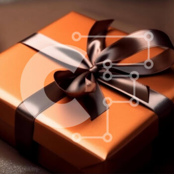 Intra Συλλεκτικό Ξύλινο Παζλ Plywood  4mm - Πορτοκαλί κουτί δώρου με καφέ κορδέλα και φιόγκο σε δερμάτινη επιφάνεια Σε Ξύλινο Κουτί - Διαστάσεις Puzzle: 10x10 cm – 25 κομμάτια - Image 1