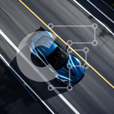 Intra Συλλεκτικό Ξύλινο Παζλ Plywood  4mm - Εναέρια άποψη του μπλε σπορ αυτοκινήτου που οδηγεί στο δρόμο Σε Ξύλινο Κουτί - Διαστάσεις Puzzle: 10x10 cm – 25 κομμάτια - Image 1