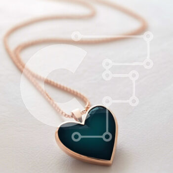 Intra Συλλεκτικό Ξύλινο Παζλ Plywood  4mm - Ροζ χρυσό μενταγιόν σε σχήμα καρδιάς με μπλε γυαλί Σε Ξύλινο Κουτί - Διαστάσεις Puzzle: 10x10 cm – 25 κομμάτια - Image 1