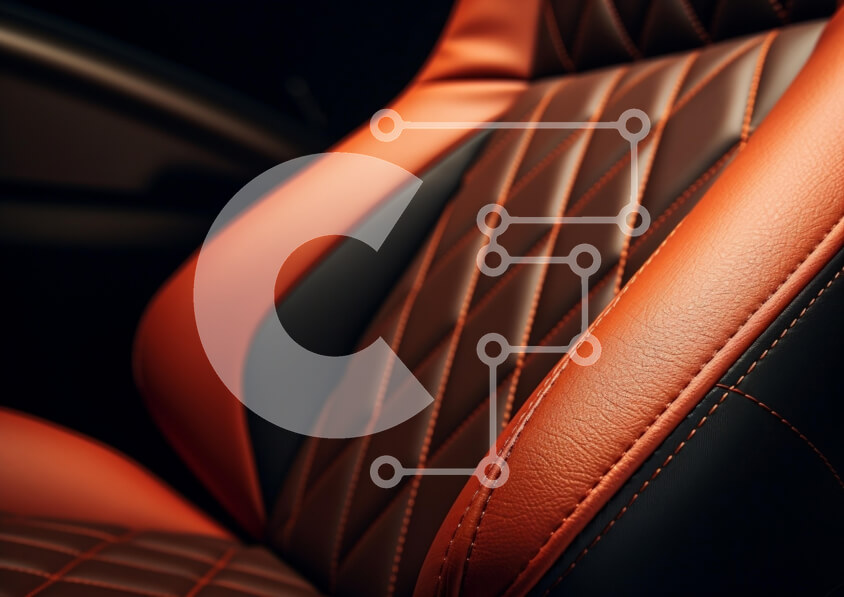 Intra Συλλεκτικό Ξύλινο Παζλ Plywood  4mm - Κοντινό πλάνο ενός πολυτελούς καθίσματος αυτοκινήτου σε πορτοκαλί και μαύρο δέρμα Σε Ξύλινο Κουτί - Διαστάσεις Puzzle: 10x10 cm – 25 κομμάτια - Image 1