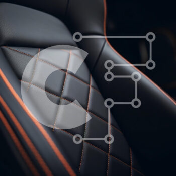 Intra Συλλεκτικό Ξύλινο Παζλ Plywood  4mm - Κοντινό πλάνο ενός πολυτελούς καθίσματος αυτοκινήτου με διαμαντένιο σχέδιο και πορτοκαλί ραφές Σε Ξύλινο Κουτί - Διαστάσεις Puzzle: 10x10 cm – 25 κομμάτια - Image 1