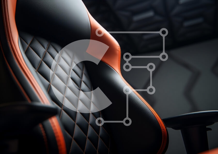 Intra Συλλεκτικό Ξύλινο Παζλ Plywood  4mm - Κοντινό πλάνο μιας καρέκλας παιχνιδιών με μαύρο δέρμα και πορτοκαλί τόνους Σε Ξύλινο Κουτί - Διαστάσεις Puzzle: 10x10 cm – 25 κομμάτια