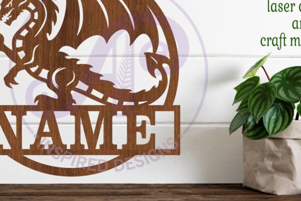 1758466495_Dragon-name-sign-design-svg-laser-cut-te-Graphics-96847481-1-1