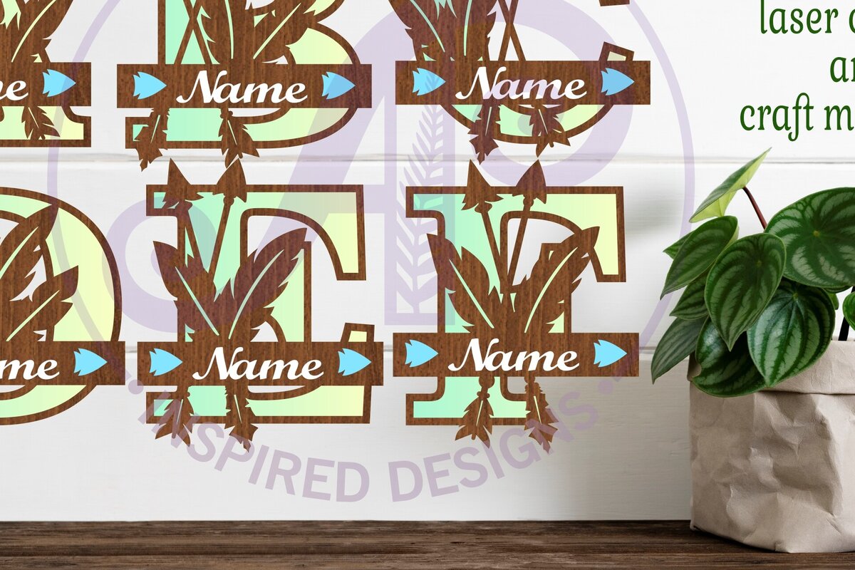 Intra απο ξύλο plywood 3mm-4mm πάχος - Πακέτο γραμμάτων μονόγραμμα με φτερά και βέλη Δίασταση 30x20 cm INTRAFABR-86121471