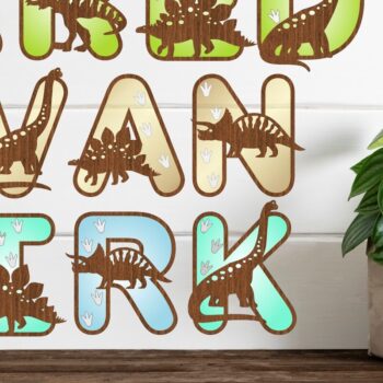 Intra απο ξύλο plywood  Χρώμα wenge 3mm-4mm πάχος - Δεινόσαυρος με ίχνη αλφαβήτου Δίασταση 30x20 cm INTRAFABR-35155467 - Image 1