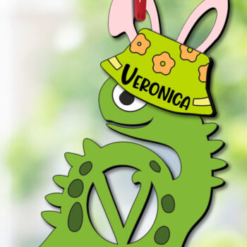 Intra απο ξύλο plywood Χρώμα wenge 3mm-4mm πάχος - Πασχαλινό Dino Letter V Στολίδι Κρεμάστρα Δίασταση 6x6 cm INTRAFABR-78634040 - Image 1