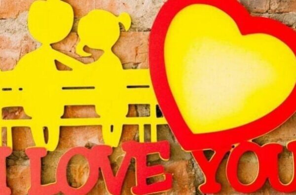 1759032708_couple-sitting-on-a-bench-love-heart-photo-frame-_1