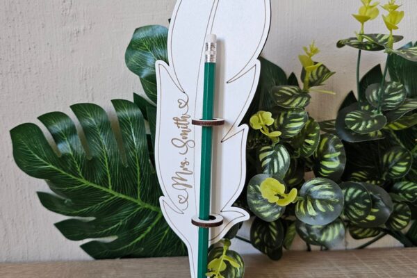 1759043962_Pen-Holder-Feather-SVG-Laser-Cut-File-Graphics-119664794-1-1