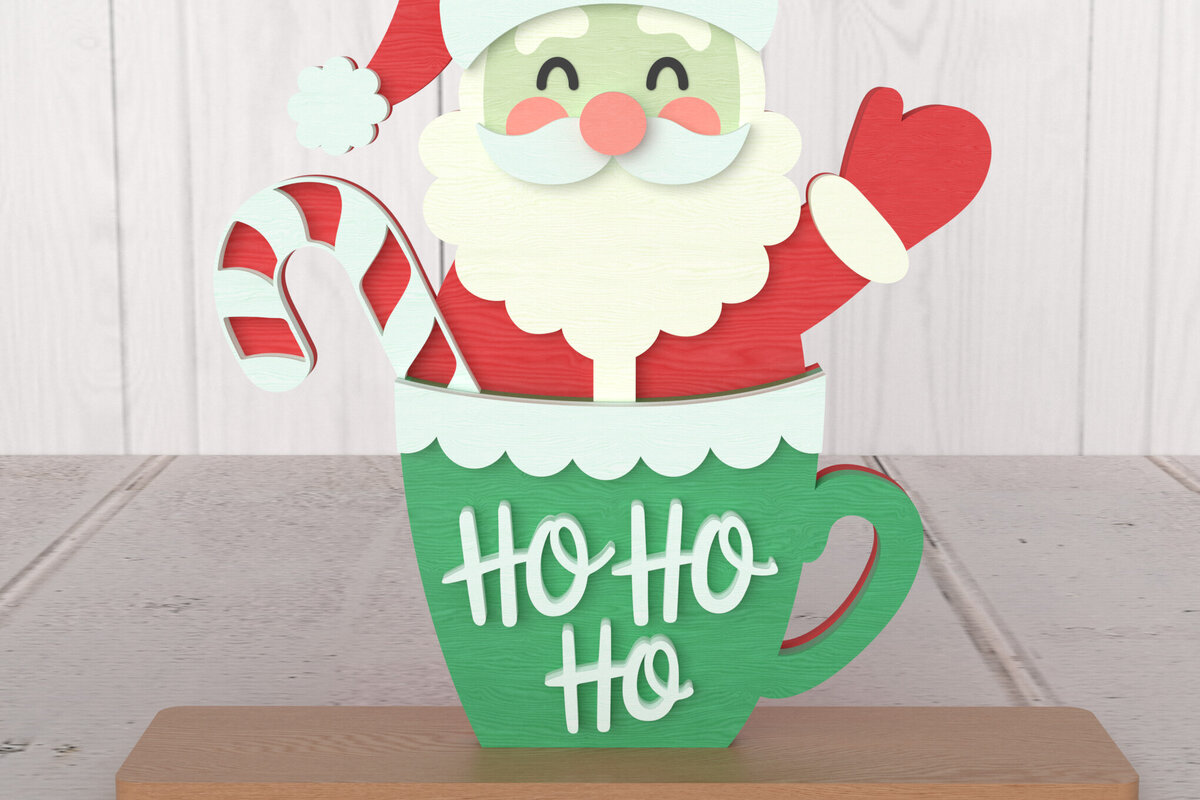 Intra απο ξύλο plywood 3mm-4mm πάχος – Χριστουγεννιάτικη διακόσμηση Santa in Cup με λέιζερ Δίασταση  20x20 cm INTRAFABR-107875644