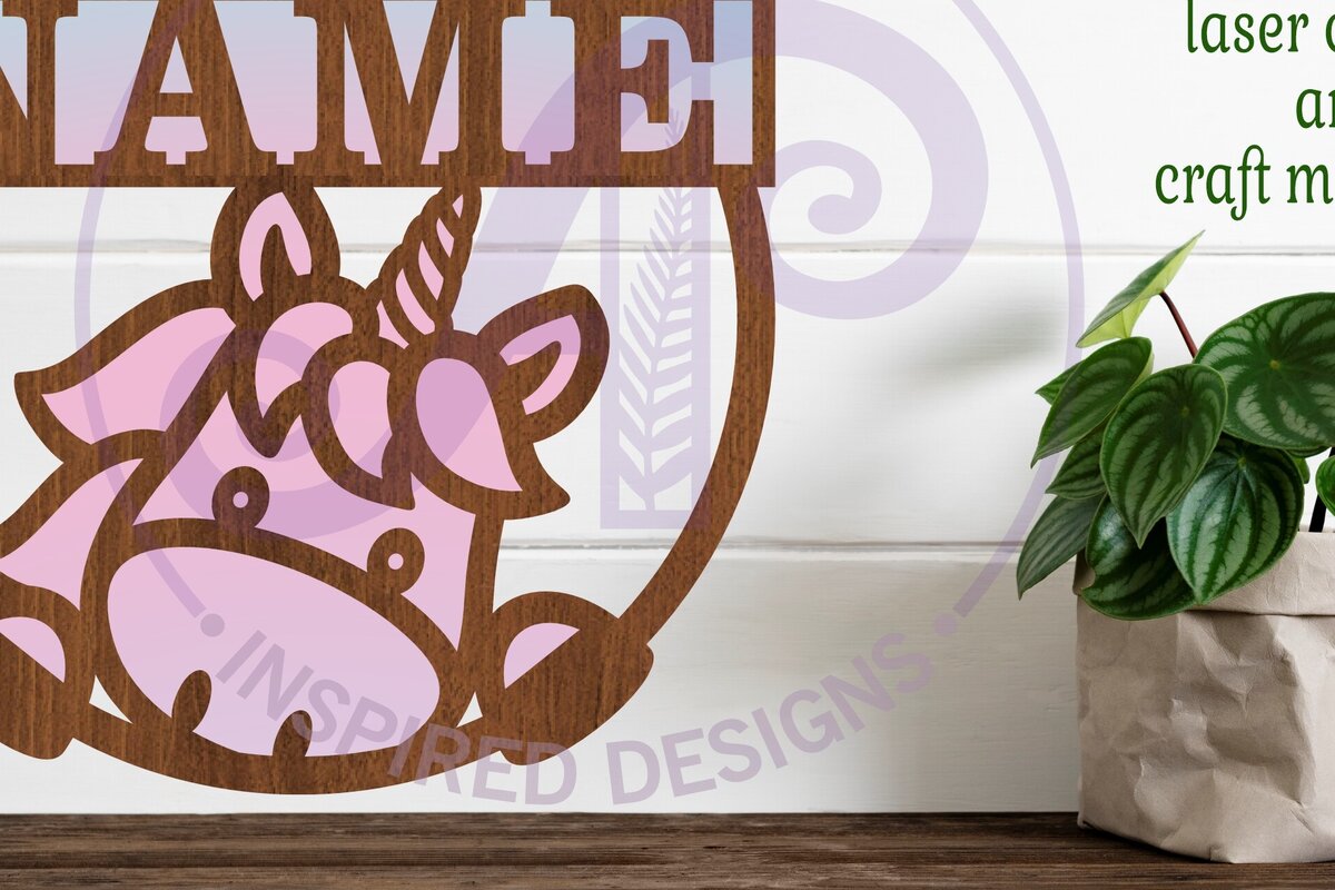 Intra απο ξύλο plywood 3mm-4mm πάχος – Μονόκερος που κρυφοκοιτάζει το όνομα Cut Laser Δίασταση  20x20 cm INTRAFABR-96173979