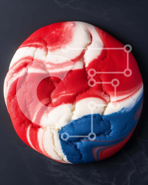 Intra Συλλεκτικό Ξύλινο Παζλ Plywood  4mm - Στριφογυρισμένο μπισκότο 4ης ​​Ιουλίου σε μαύρη επιφάνεια Σε Ξύλινο Κουτί - Διαστάσεις: 10x10 cm – 25 κομμάτια