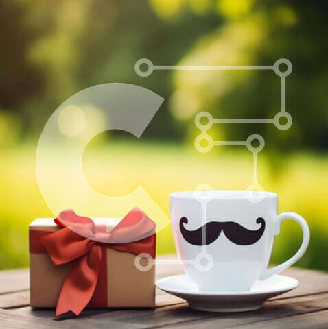 Intra Συλλεκτικό Ξύλινο Παζλ Plywood 4mm - Λευκό φλιτζάνι καφέ με πορτοκαλί μουστάκι και κόκκινο κουτί δώρου σε ξύλινο τραπέζι Σε Ξύλινο Κουτί - Διαστάσεις: 10x10 cm – 25 κομμάτια - Image 1