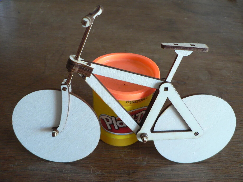 Intra απο ξύλο plywood 3mm-4mm πάχος - Flatpack Ξύλινο ποδήλατο Δίασταση 20x20 cm Intraeaxys-eo2096q7