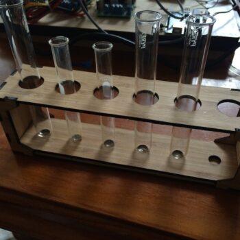 Intra απο ξύλο plywood 3mm-4mm πάχος - Ράφι δοκιμαστικού σωλήνα Δίασταση 30x30 cm Intraeaxys-pok399j7 - Image 1