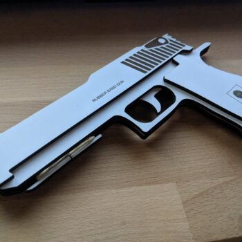 Intra απο ξύλο plywood 3mm-4mm πάχος - Ξύλινο Πιστόλι Λαστιχένιο Δίασταση 30x30 cm Intraeaxys-joedje61 - Image 1